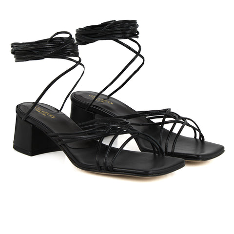 Black tie-fastening leather sandals